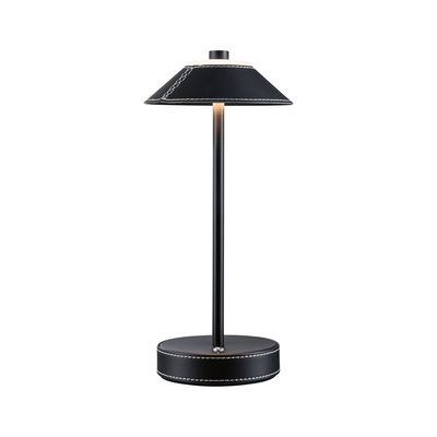 Black table lamp with leather cover and white stitching, modern LED lighting for living spaces.