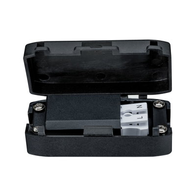 Black plastic housing with open lid showing white terminal blocks for LED lighting connection.