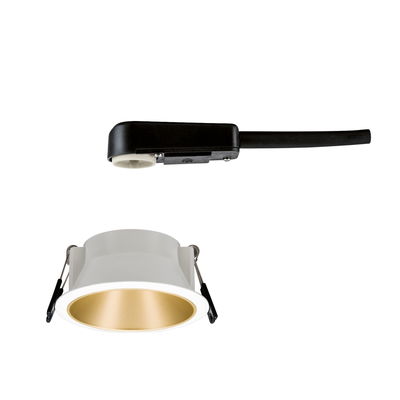 White recessed spotlight with gold reflector and black connector cable for LED lighting