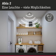 Abia 2 LED-Deckenleuchte in Edelstahl mit Sensorfunktion über Waschmaschine und Regalen im Waschraum