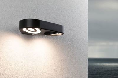 Schwarze LED-Wandleuchte aus Metall mit rundem Lichtdesign, ideal für Außenbereiche und moderne Beleuchtung