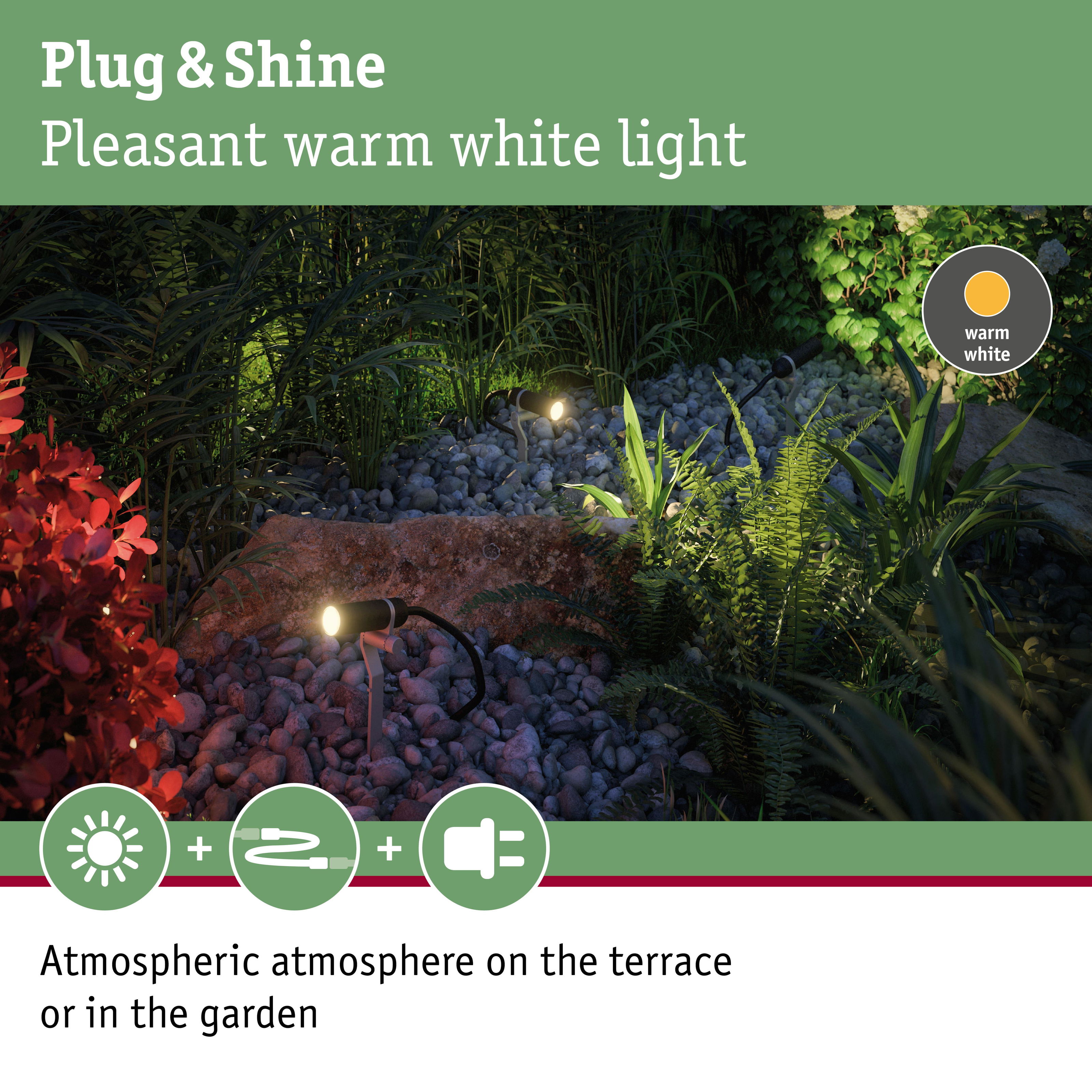 Black LED garden spotlights with warm white light on gravel and plants for atmospheric outdoor lighting