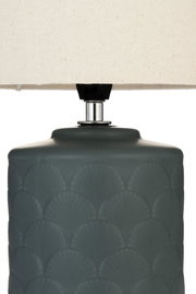 Table lamp with grey ceramic base and cream fabric shade for elegant home lighting