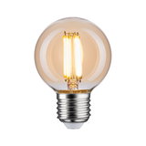Round LED bulb with warm white light and transparent amber glass, energy-saving lighting solution