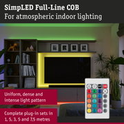 LED light strip with remote in living room with yellow and green lighting for atmospheric indoor lighting