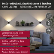Zorik Akku-Leuchte in Schwarz mit warmweißem Licht für drinnen und draußen, kabellose LED-Wandlampe