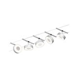 Modern LED cable system with five white round metal lights for flexible room lighting