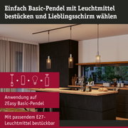 Moderne Basic-Pendelleuchte mit Metallgitter in Schwarz und warmweißem Licht in Küchenumgebung