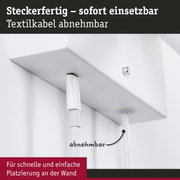 Weißes Steckdosengehäuse mit abnehmbarem Textilkabel für einfache Wandmontage