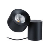 Black metal LED spotlight with adjustable head for focused indoor lighting and modern design