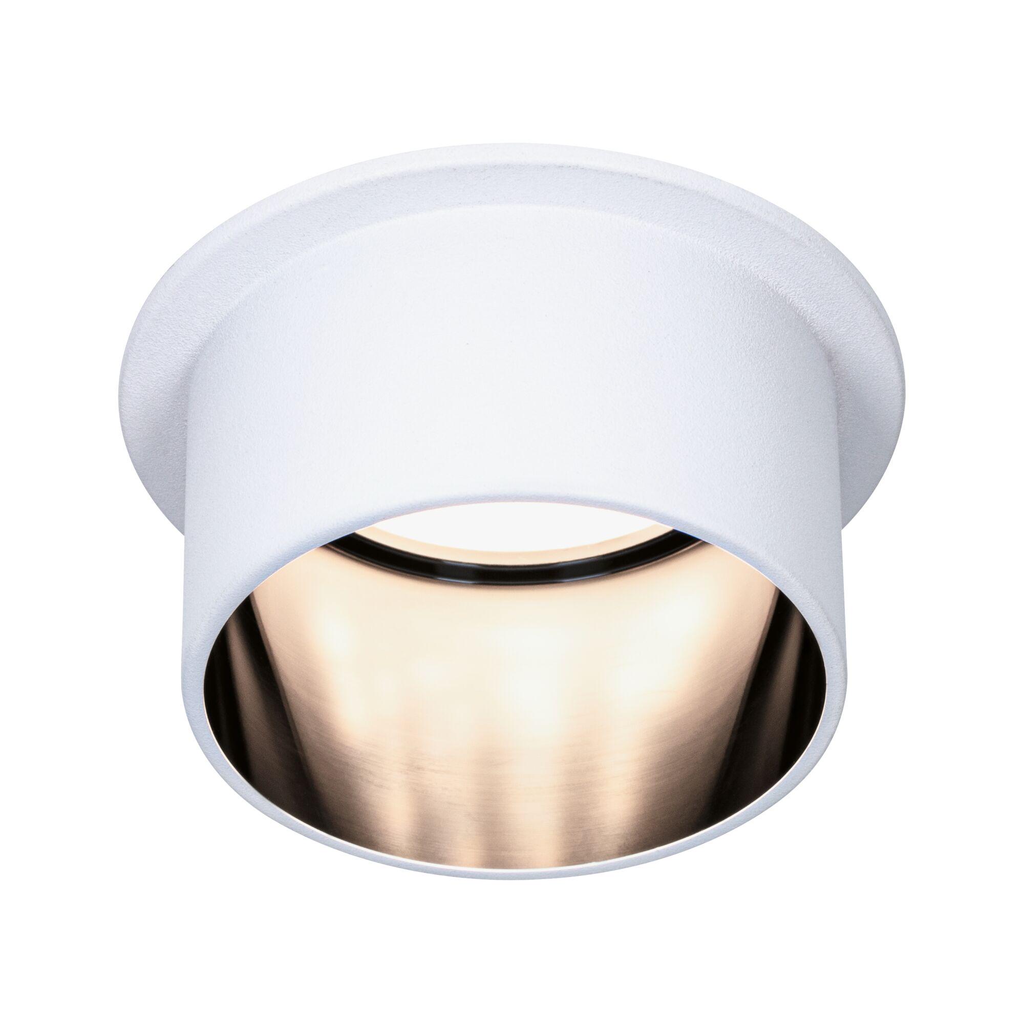 White metal recessed ceiling spotlight with warm light for modern interior lighting