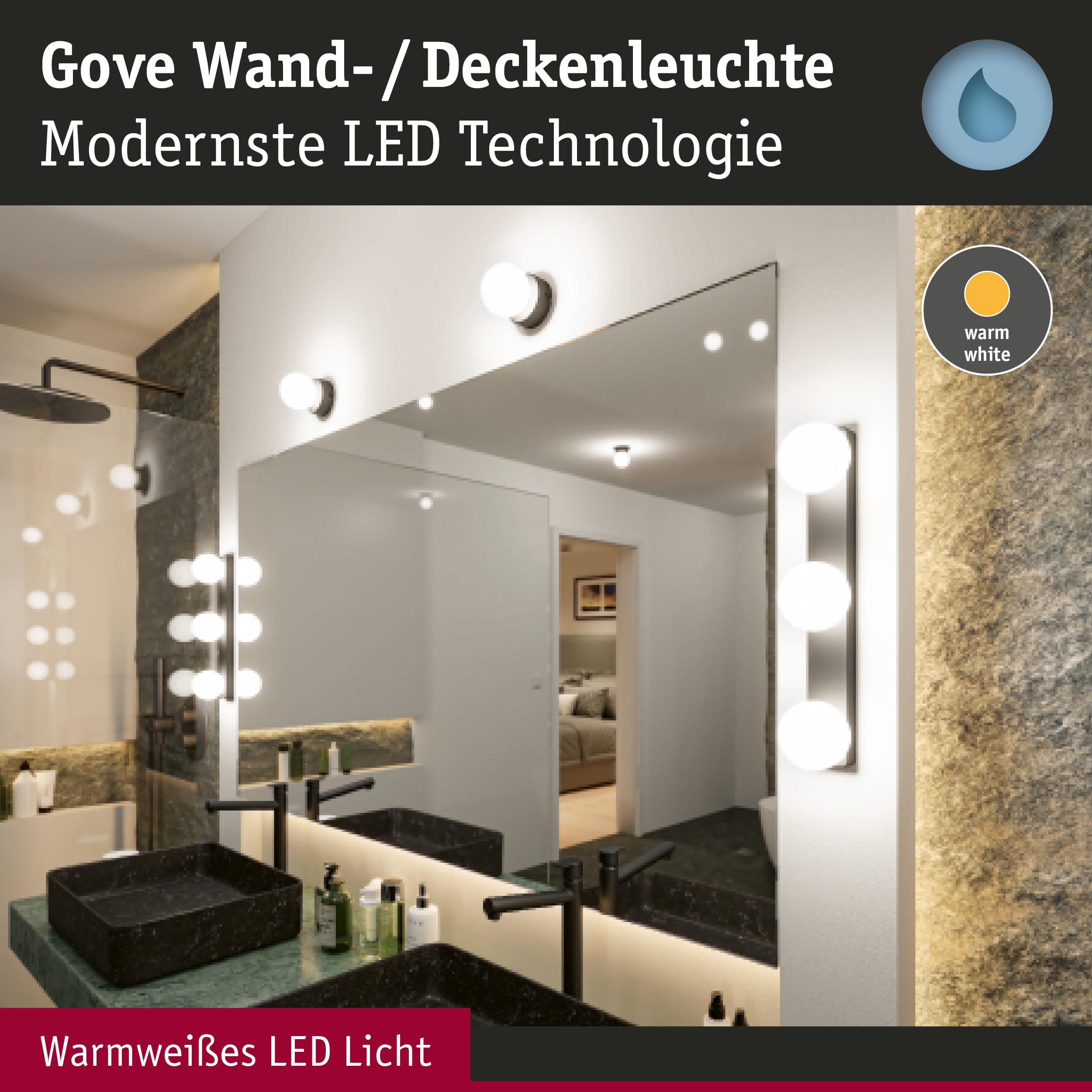 Gove Wand- und Deckenleuchte mit warmweißem LED-Licht in modernem Badezimmer mit Spiegel.