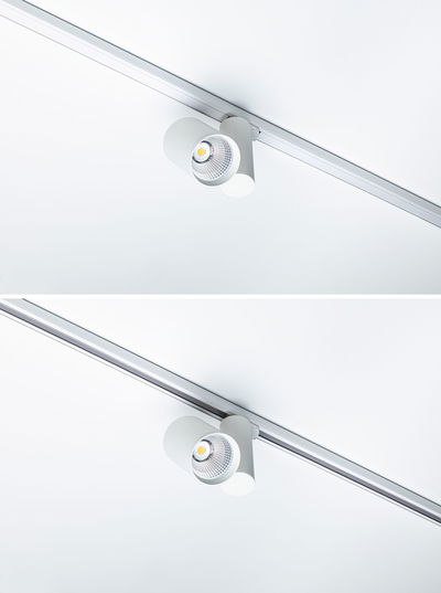 Projecteur LED blanc moderne en métal sur rail pour un éclairage d’intérieur flexible
