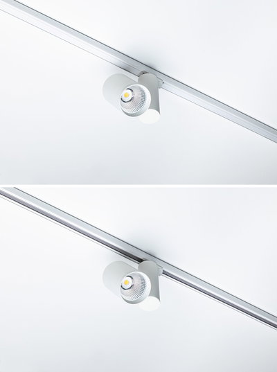 Modern white metal LED spotlight on track system for flexible room lighting solutions