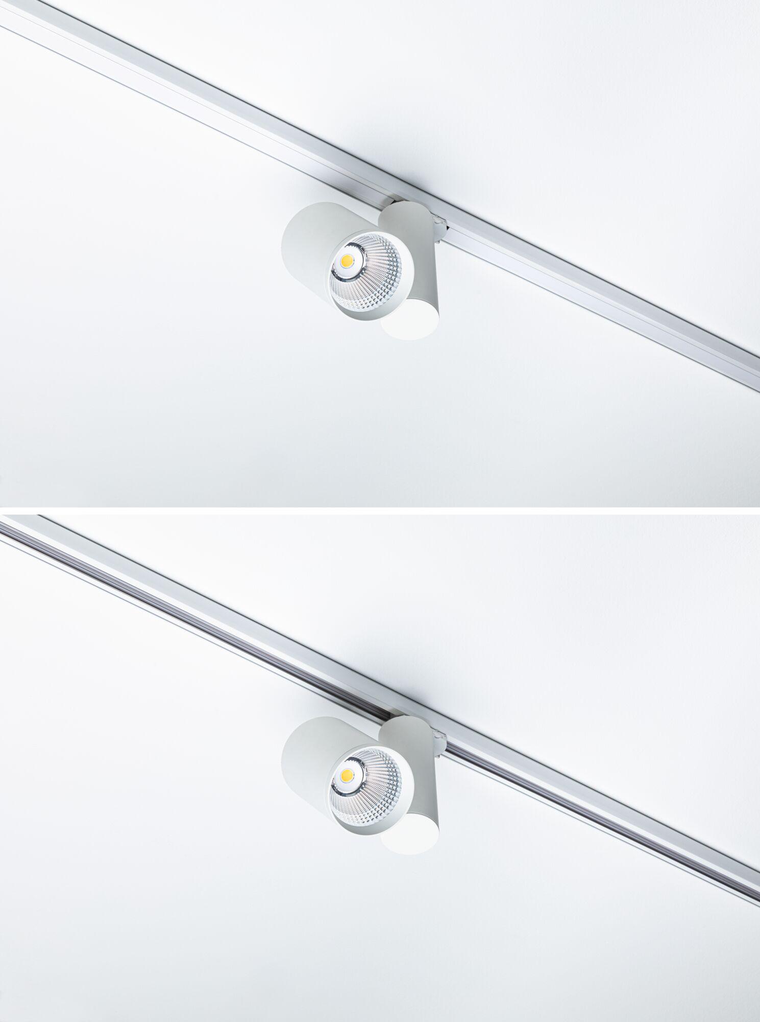 Modern white metal LED spotlight on track system for flexible room lighting solutions