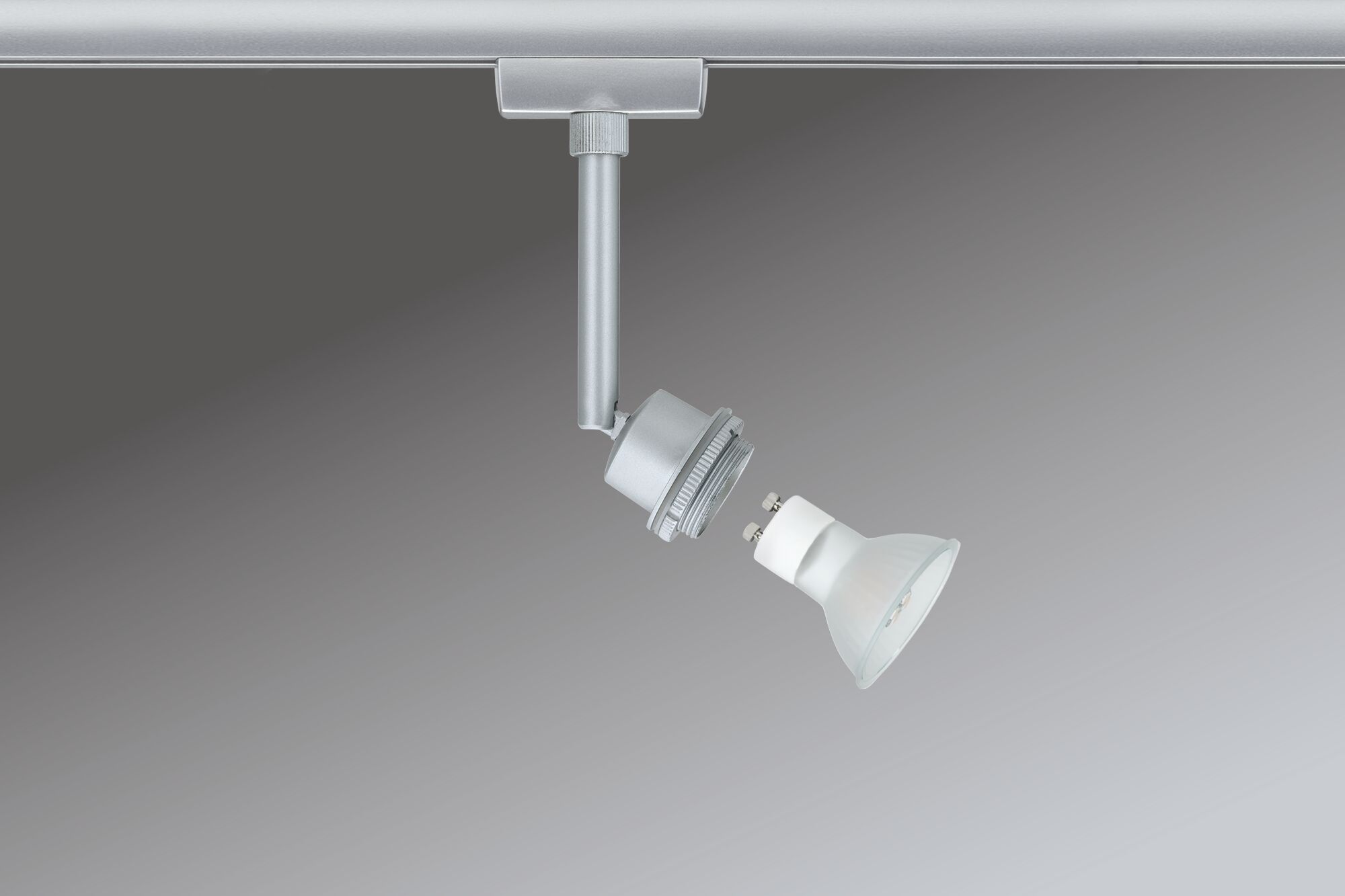 Zilveren metalen railspot met afneembare witte GU10 LED-lamp voor verstelbare verlichting