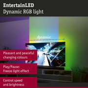 Dynamic RGB LED light strip changing colours behind TV in living room with control options