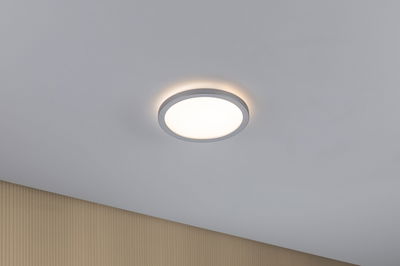 Round LED ceiling light with white diffuser and grey frame for modern room lighting