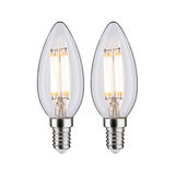 Zwei klare LED-Kerzenlampen mit E14-Fassung und warmweißem Licht für dekorative Beleuchtung