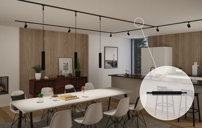 Modern dining room with black metal track lighting and black LED spotlights for living space illumination