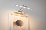 Applique LED moderne blanche et chromée avec lumière blanc chaud pour tableaux et photos murales.