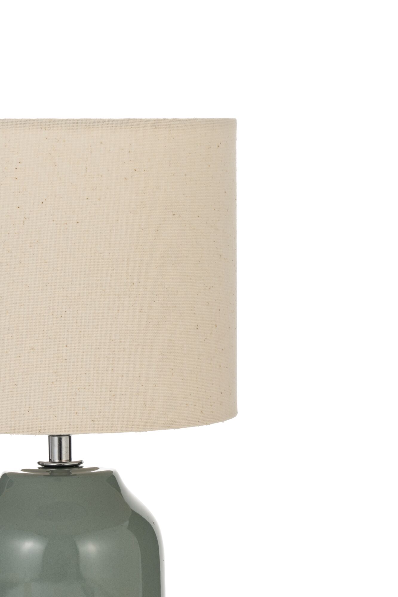 Table lamp with green ceramic base and beige fabric shade for ambient lighting