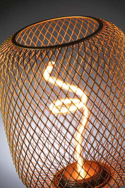 Modern table lamp with spiral LED light and brown metal mesh shade, ideal for cozy living spaces