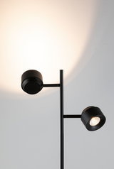Modern black LED floor lamp with two adjustable spotlights for targeted room lighting