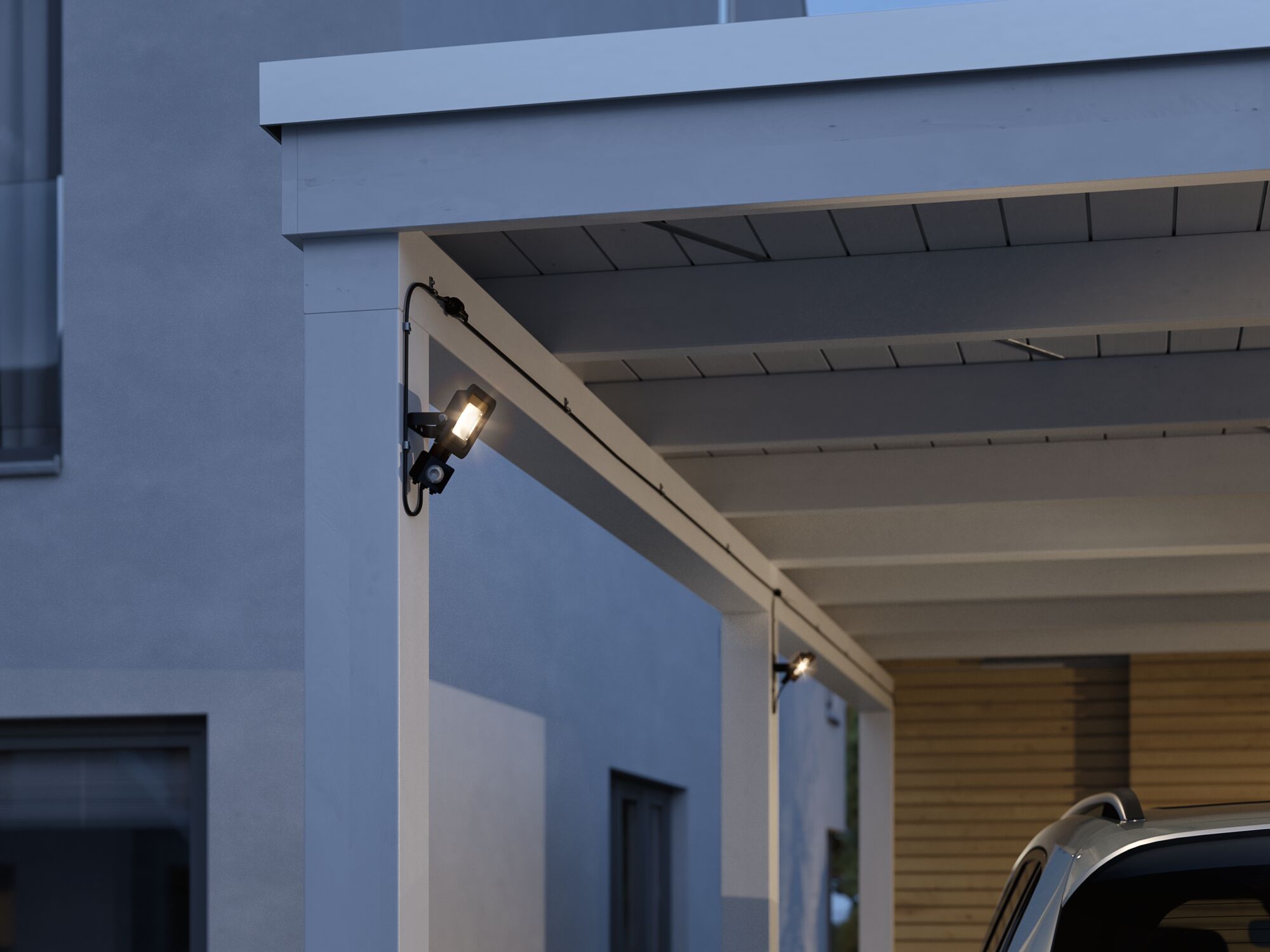 Black LED outdoor wall light with motion sensor mounted on white wooden pergola for garden lighting.
