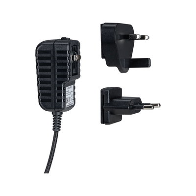 Black power adapter with two interchangeable UK and EU plugs, plastic material, electrical charger accessory