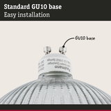 Close-up of a white GU10 base lamp holder with glass reflector for LED bulbs