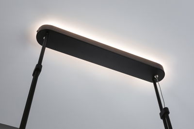 Black LED ceiling light with indirect warm white illumination for modern interiors