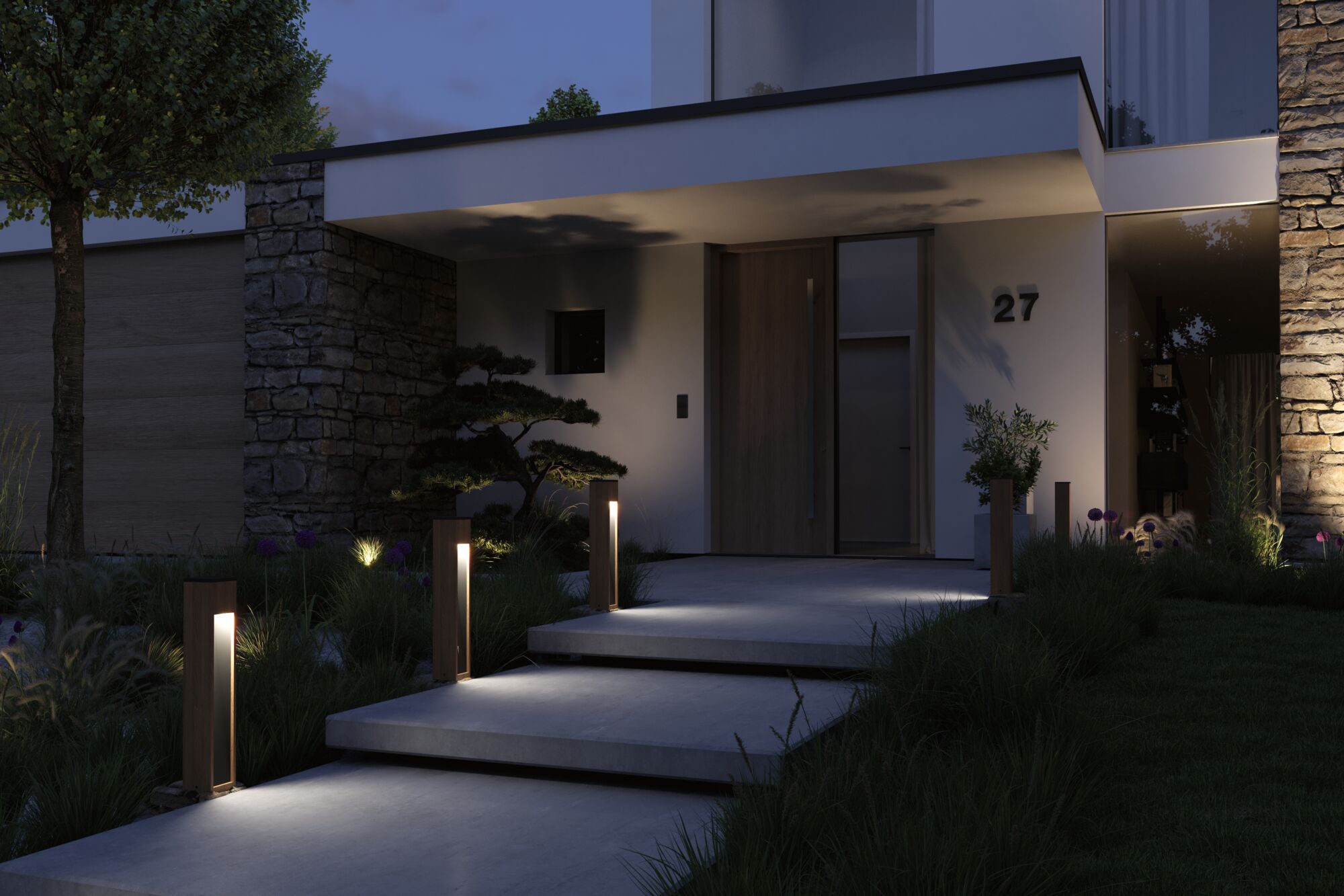 Modern outdoor lighting with warm white LED wooden bollards at house entrance with stone wall