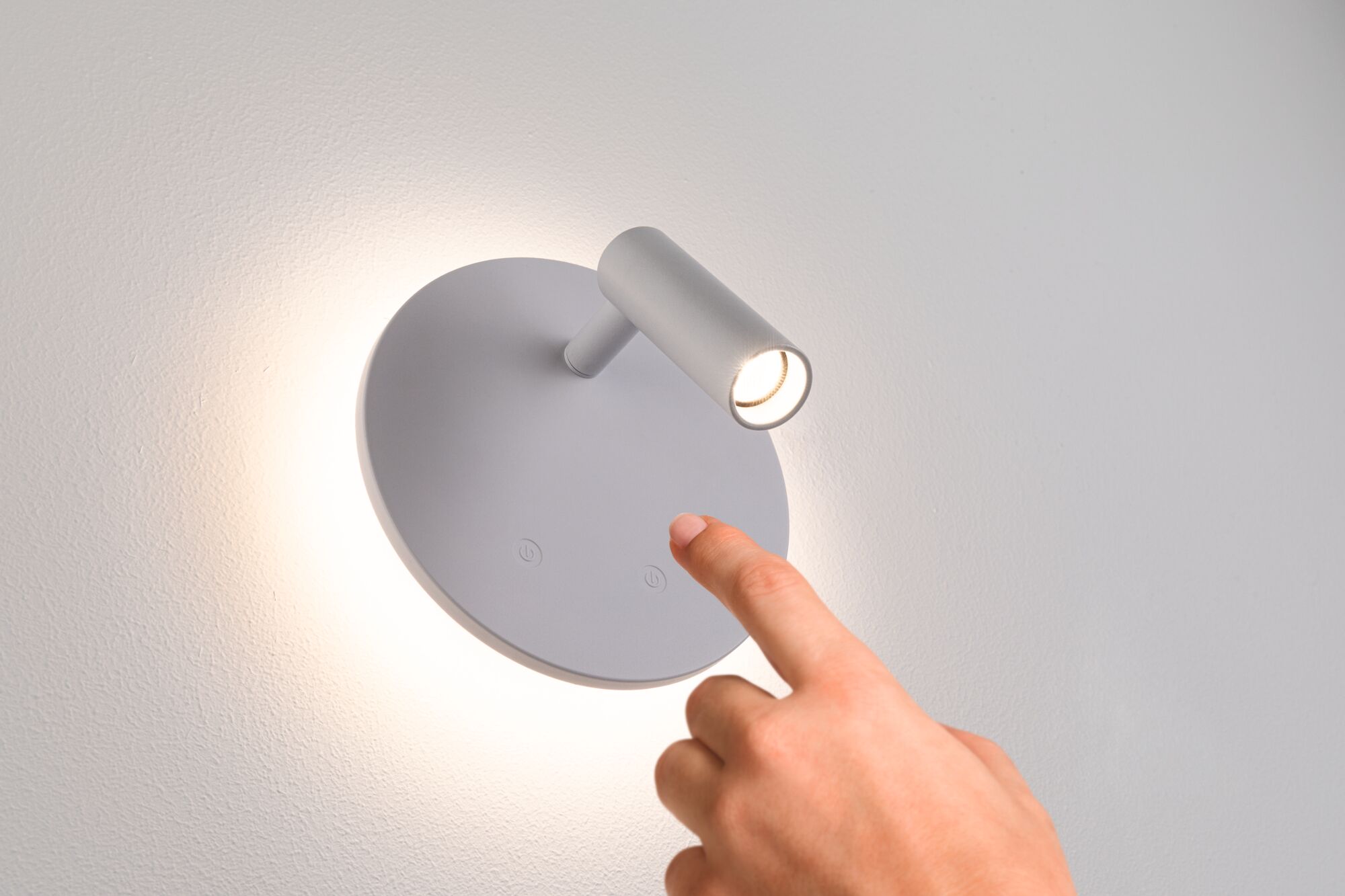 Grey LED wall light with round base and adjustable spotlight, touch-sensitive, modern indoor lighting