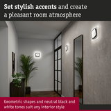 Modern black and white geometric wall lights creating stylish room lighting and interior decoration accents