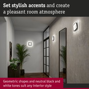 Modern black and white geometric wall lights creating stylish room accents and ambient interior lighting