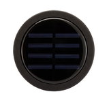 Round black solar panel with glass cover and matte frame for sustainable energy generation