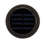 Rundt sort solpanel med glasdæksel og mat ramme til bæredygtig energiproduktion