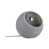 Round table lamp made of grey concrete with visible LED bulb and fabric cable for modern lighting