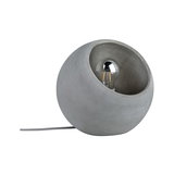 Lampe de table ronde en béton gris avec ampoule LED visible et câble textile pour éclairage moderne