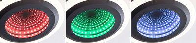 Trois spots LED encastrés noirs affichent des spirales lumineuses rouges, vertes et bleues pour un éclairage moderne.