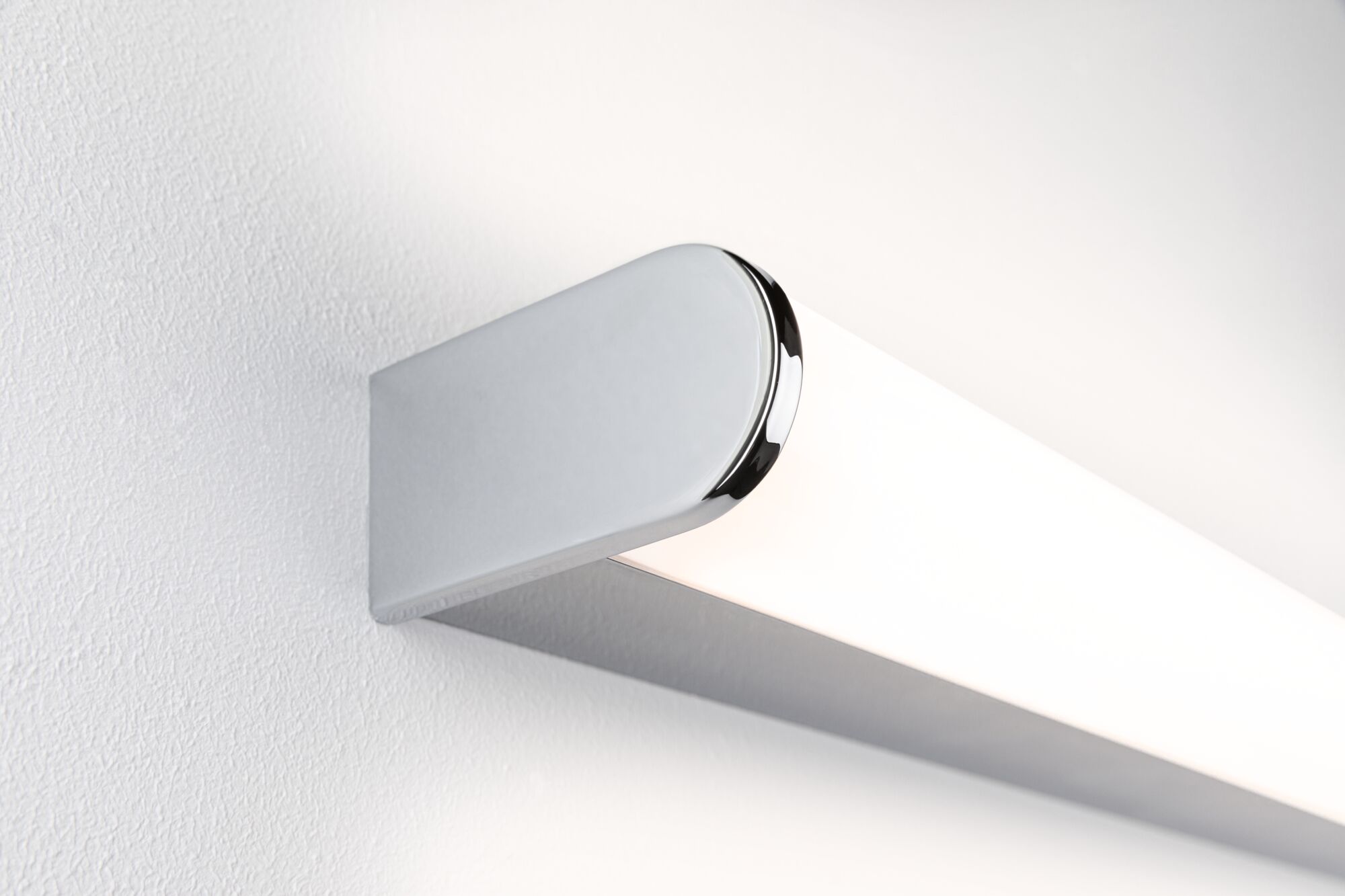 Modern LED wall light with white diffuser and silver metal housing for indoor lighting