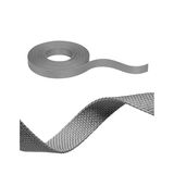 Grey woven textile tape in roll and close-up, versatile fastening tape with textured surface