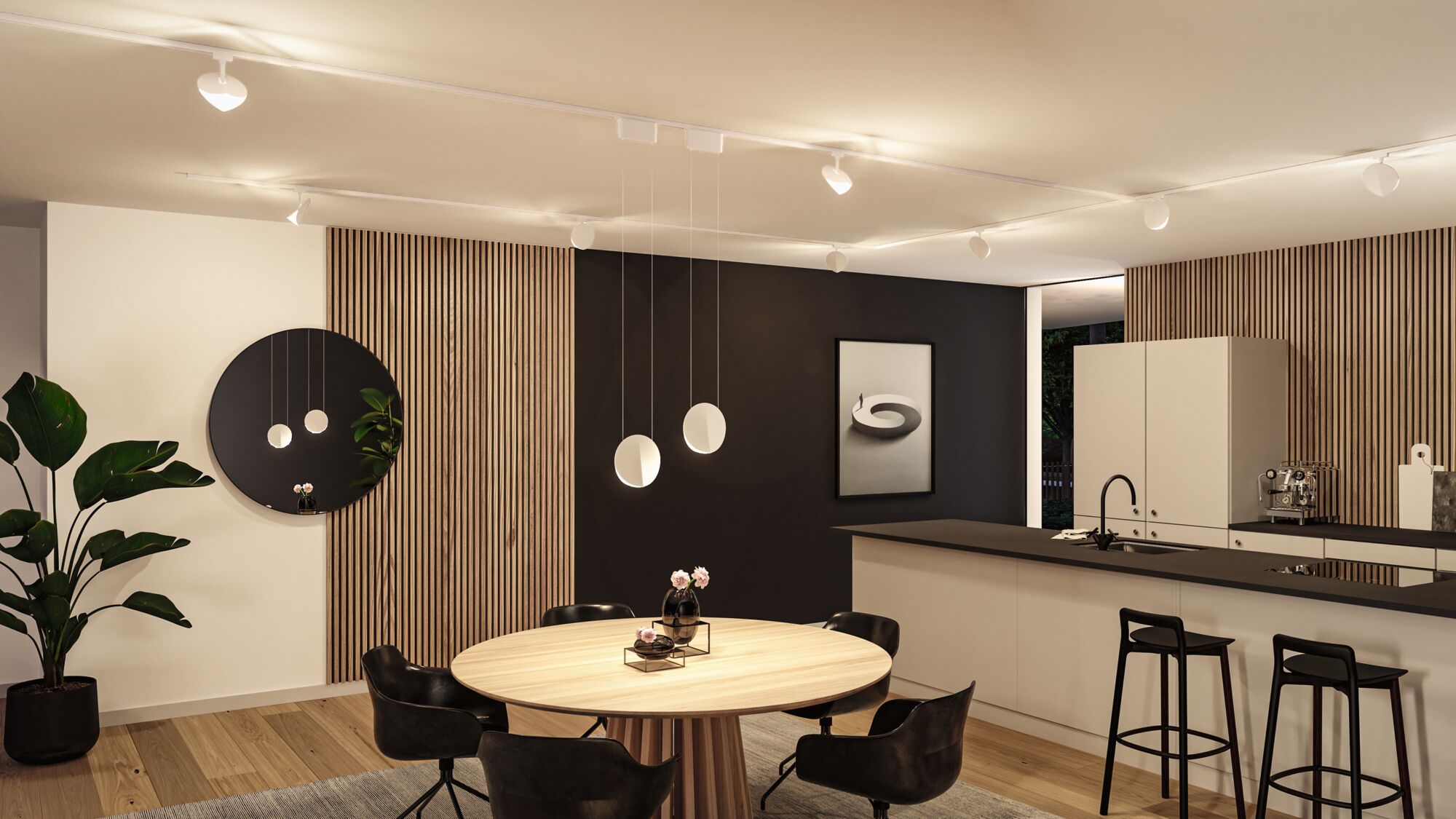 Moderne Küche mit runder Holz-Tischplatte, schwarzen Stühlen und minimalistischer LED-Deckenbeleuchtung