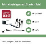 Starter-Set mit drei schwarzen LED-Gartenleuchten, Kabel und Trafo für einfache Außenbeleuchtung.
