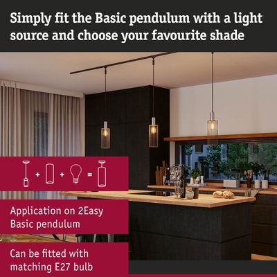 Modern kitchen with Basic Pendulum black metal pendant lights featuring warm E27 bulbs.