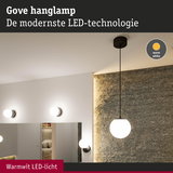 Gove LED-hanglamp met warm wit licht en zwarte kabel tegen grijze muur in moderne ruimte