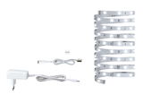 Bande LED blanche avec adaptateur secteur et câble de connexion pour éclairage flexible.