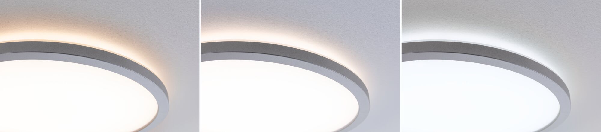 Trois plafonniers LED ronds avec cadre métallique gris et température de couleur réglable pour pièces à vivre.