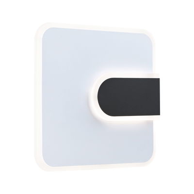 Modern LED wall light in white and black with indirect lighting for stylish room illumination